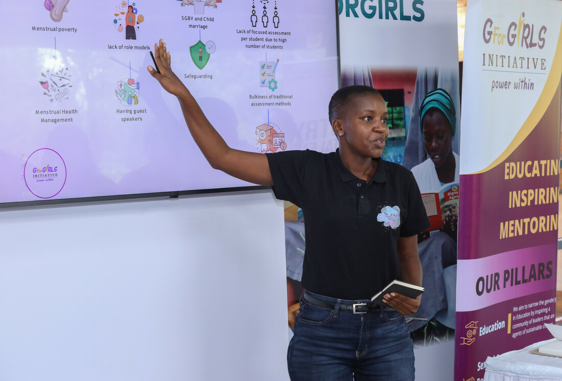 Empowered young women engaged in activities at the G for Girls program, highlighting female leadership development and educational opportunities